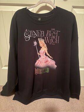 Hot Topic Black Sweatshirt with Pink Graphic "Glinda Best Witch"